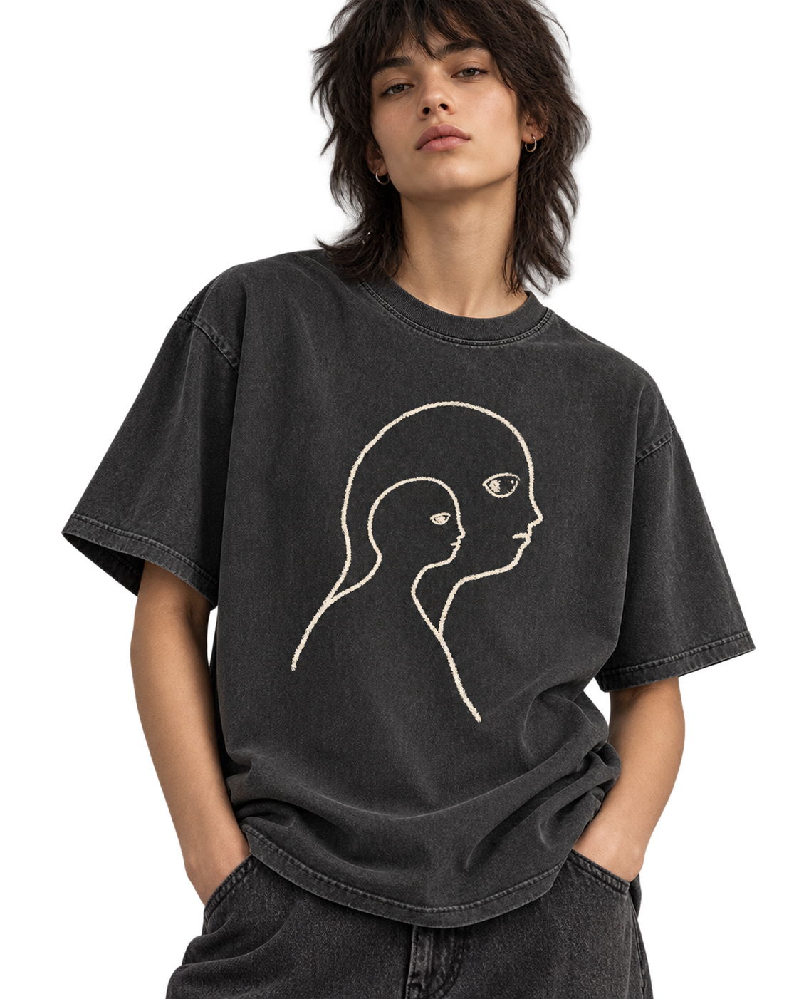 Model wearing Second Self Tee in Charcoal, closer front view of nested-profile artwork. Transparent AI-generated styling preview; fit and print scale are illustrative.