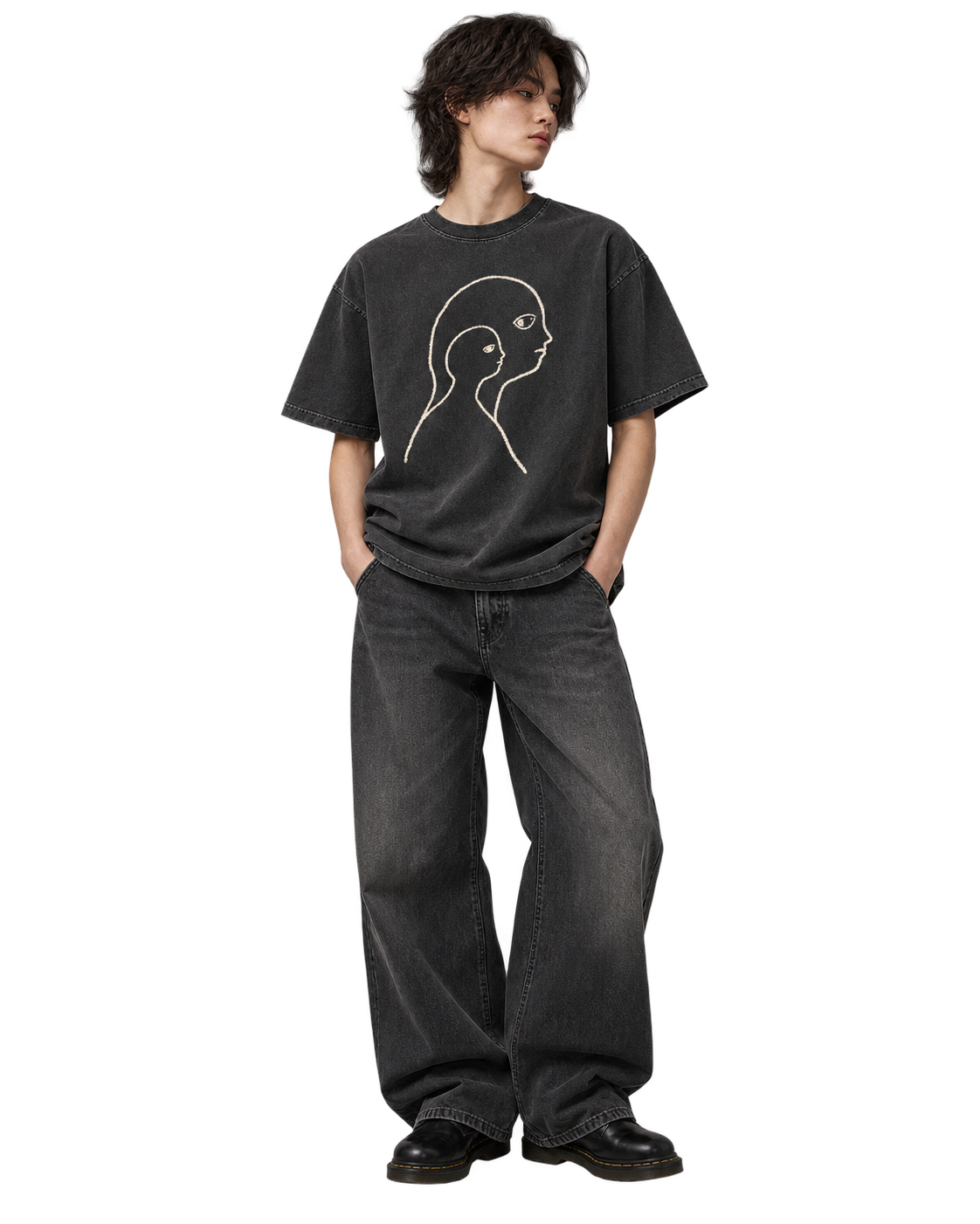 Model wearing Second Self Tee in Charcoal, full-length view with nested-profile artwork. Transparent AI-generated styling preview; fit and print scale are illustrative.